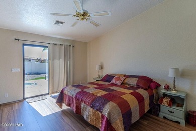 Welcome to this beautifully maintained 1,630 sq ft 2 bed, 2 bath on London Bridge Golf Course in Arizona - for sale on GolfHomes.com, golf home, golf lot