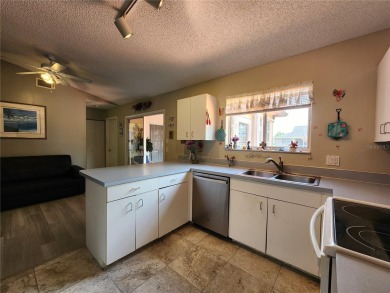 BEAUTIFUL LAKE VIEWS AND FLORIDA CHARM!This wonderful home on Duffys Golf Center in Florida - for sale on GolfHomes.com, golf home, golf lot