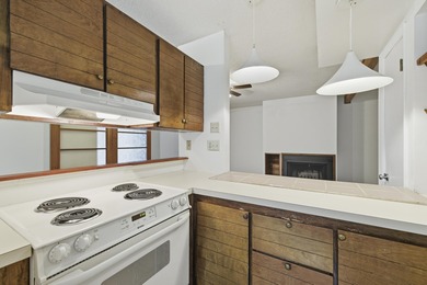 Overlook a golf course/pond in this ultra contemporary condo // on Hilaman Park Golf Course in Florida - for sale on GolfHomes.com, golf home, golf lot