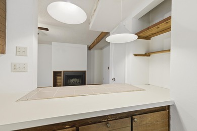 Overlook a golf course/pond in this ultra contemporary condo // on Hilaman Park Golf Course in Florida - for sale on GolfHomes.com, golf home, golf lot