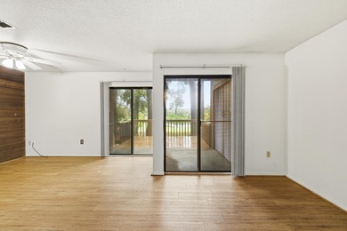 Overlook a golf course/pond in this ultra contemporary condo // on Hilaman Park Golf Course in Florida - for sale on GolfHomes.com, golf home, golf lot