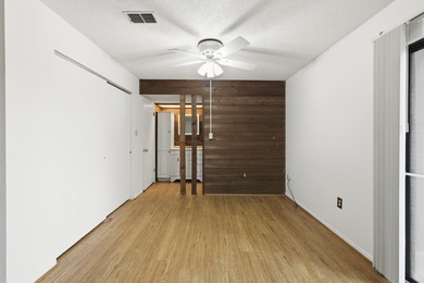 Overlook a golf course/pond in this ultra contemporary condo // on Hilaman Park Golf Course in Florida - for sale on GolfHomes.com, golf home, golf lot