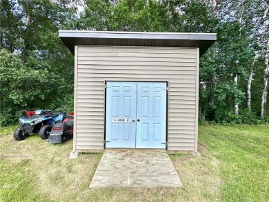 This impressive 3-bedroom, 2-bathroom home proudly overlooks the on Headwaters Country Club in Minnesota - for sale on GolfHomes.com, golf home, golf lot