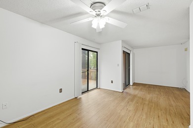 Overlook a golf course/pond in this ultra contemporary condo // on Hilaman Park Golf Course in Florida - for sale on GolfHomes.com, golf home, golf lot