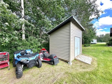 This impressive 3-bedroom, 2-bathroom home proudly overlooks the on Headwaters Country Club in Minnesota - for sale on GolfHomes.com, golf home, golf lot