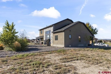 Discover Your Dream Home in Montrose: A Contemporary 2-Story on The Bridges Golf and Country Club in Colorado - for sale on GolfHomes.com, golf home, golf lot
