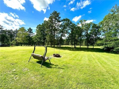 This impressive 3-bedroom, 2-bathroom home proudly overlooks the on Headwaters Country Club in Minnesota - for sale on GolfHomes.com, golf home, golf lot