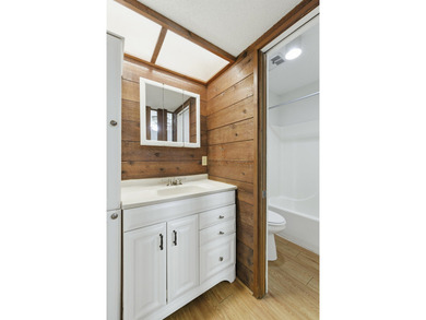 Overlook a golf course/pond in this ultra contemporary condo // on Hilaman Park Golf Course in Florida - for sale on GolfHomes.com, golf home, golf lot