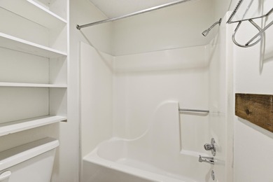 Overlook a golf course/pond in this ultra contemporary condo // on Hilaman Park Golf Course in Florida - for sale on GolfHomes.com, golf home, golf lot