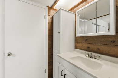 Overlook a golf course/pond in this ultra contemporary condo // on Hilaman Park Golf Course in Florida - for sale on GolfHomes.com, golf home, golf lot