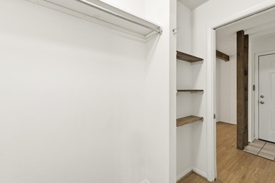 Overlook a golf course/pond in this ultra contemporary condo // on Hilaman Park Golf Course in Florida - for sale on GolfHomes.com, golf home, golf lot