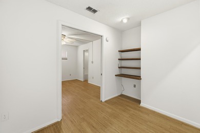 Overlook a golf course/pond in this ultra contemporary condo // on Hilaman Park Golf Course in Florida - for sale on GolfHomes.com, golf home, golf lot