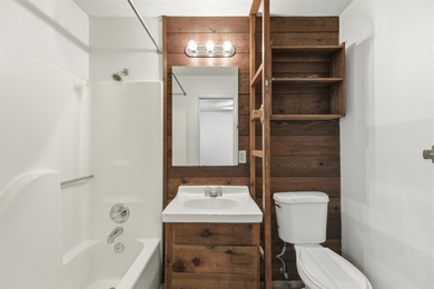 Overlook a golf course/pond in this ultra contemporary condo // on Hilaman Park Golf Course in Florida - for sale on GolfHomes.com, golf home, golf lot