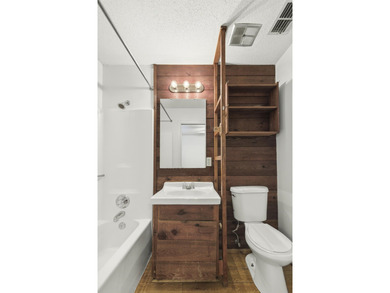 Overlook a golf course/pond in this ultra contemporary condo // on Hilaman Park Golf Course in Florida - for sale on GolfHomes.com, golf home, golf lot