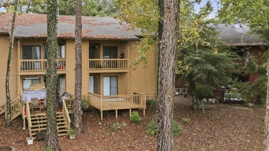 Overlook a golf course/pond in this ultra contemporary condo // on Hilaman Park Golf Course in Florida - for sale on GolfHomes.com, golf home, golf lot