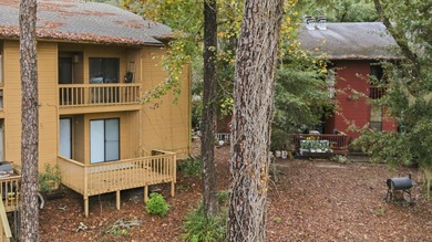 Overlook a golf course/pond in this ultra contemporary condo // on Hilaman Park Golf Course in Florida - for sale on GolfHomes.com, golf home, golf lot