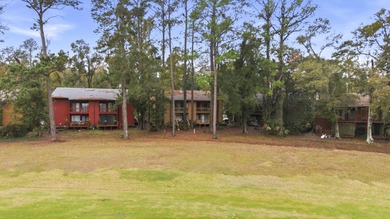 Overlook a golf course/pond in this ultra contemporary condo // on Hilaman Park Golf Course in Florida - for sale on GolfHomes.com, golf home, golf lot