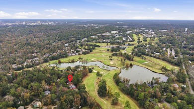 Overlook a golf course/pond in this ultra contemporary condo // on Hilaman Park Golf Course in Florida - for sale on GolfHomes.com, golf home, golf lot