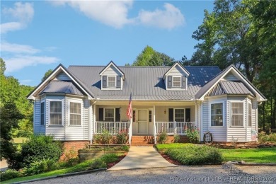 Nestled in the sought-after gated community of Carolina Trace on Carolina Trace Country Club in North Carolina - for sale on GolfHomes.com, golf home, golf lot