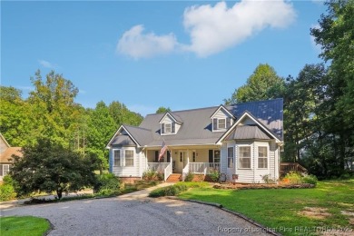 Nestled in the sought-after gated community of Carolina Trace on Carolina Trace Country Club in North Carolina - for sale on GolfHomes.com, golf home, golf lot