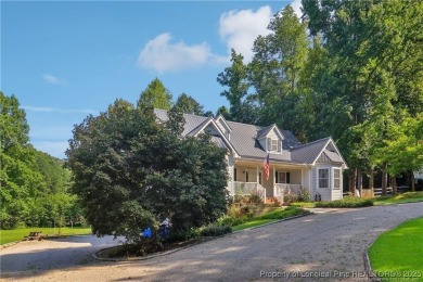 Nestled in the sought-after gated community of Carolina Trace on Carolina Trace Country Club in North Carolina - for sale on GolfHomes.com, golf home, golf lot