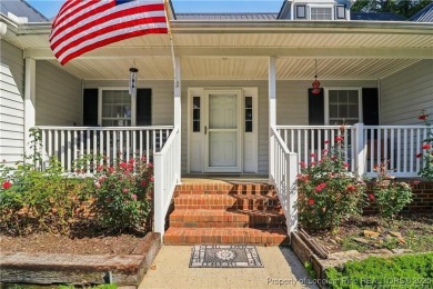 Nestled in the sought-after gated community of Carolina Trace on Carolina Trace Country Club in North Carolina - for sale on GolfHomes.com, golf home, golf lot