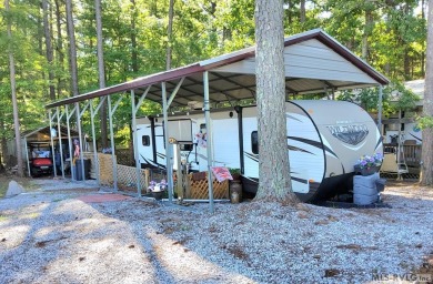 Begin your journey to relaxation at River Ridge Golf & Camping on River Ridge Golf Club in Virginia - for sale on GolfHomes.com, golf home, golf lot