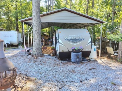Begin your journey to relaxation at River Ridge Golf & Camping on River Ridge Golf Club in Virginia - for sale on GolfHomes.com, golf home, golf lot