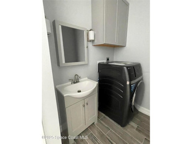 A newly constructed custom home with a detached garage awaits on Willow Lakes RV and Golf Resort in Florida - for sale on GolfHomes.com, golf home, golf lot