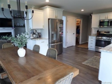 Sought after Waterstone Sub. 15 lakes and golf course community on Boulder Pointe Golf Club and Conference Center in Michigan - for sale on GolfHomes.com, golf home, golf lot