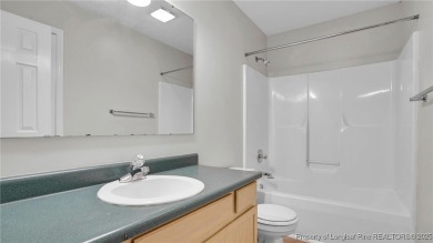 Welcome to this beautifully maintained 3-bedroom, 2-bathroom on Carolina Lakes Country Club in North Carolina - for sale on GolfHomes.com, golf home, golf lot