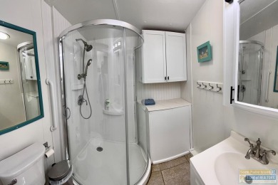 Cute and nicely updated park model featuring large full length on Long Island Golf Course in Texas - for sale on GolfHomes.com, golf home, golf lot