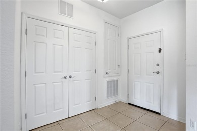 Welcome to this beautifully maintained first-floor 3-bedroom on ChampionsGate Golf Resort in Florida - for sale on GolfHomes.com, golf home, golf lot