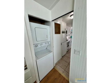 Cute and nicely updated park model featuring large full length on Long Island Golf Course in Texas - for sale on GolfHomes.com, golf home, golf lot