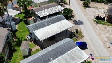 Cute and nicely updated park model featuring large full length on Long Island Golf Course in Texas - for sale on GolfHomes.com, golf home, golf lot