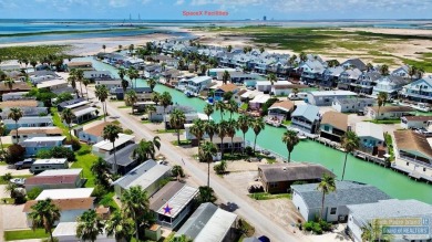 Cute and nicely updated park model featuring large full length on Long Island Golf Course in Texas - for sale on GolfHomes.com, golf home, golf lot