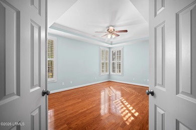 Spacious 5-bedroom, 3.5-bath home in the desirable gated Island on Island West Golf Club in South Carolina - for sale on GolfHomes.com, golf home, golf lot