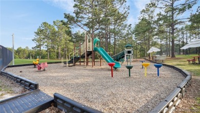 Welcome to this beautifully maintained 3-bedroom, 2-bathroom on Carolina Lakes Country Club in North Carolina - for sale on GolfHomes.com, golf home, golf lot