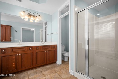 Spacious 5-bedroom, 3.5-bath home in the desirable gated Island on Island West Golf Club in South Carolina - for sale on GolfHomes.com, golf home, golf lot