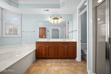 Spacious 5-bedroom, 3.5-bath home in the desirable gated Island on Island West Golf Club in South Carolina - for sale on GolfHomes.com, golf home, golf lot