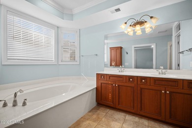 Spacious 5-bedroom, 3.5-bath home in the desirable gated Island on Island West Golf Club in South Carolina - for sale on GolfHomes.com, golf home, golf lot