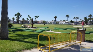 Cute and nicely updated park model featuring large full length on Long Island Golf Course in Texas - for sale on GolfHomes.com, golf home, golf lot