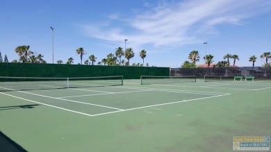 Cute and nicely updated park model featuring large full length on Long Island Golf Course in Texas - for sale on GolfHomes.com, golf home, golf lot