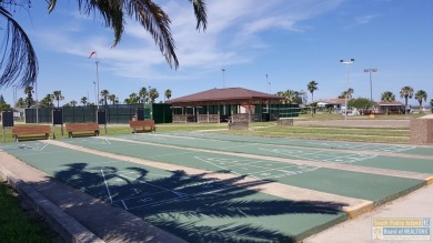 Cute and nicely updated park model featuring large full length on Long Island Golf Course in Texas - for sale on GolfHomes.com, golf home, golf lot