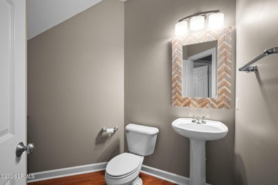 Spacious 5-bedroom, 3.5-bath home in the desirable gated Island on Island West Golf Club in South Carolina - for sale on GolfHomes.com, golf home, golf lot