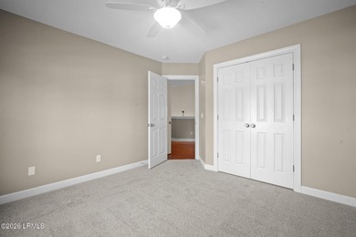 Spacious 5-bedroom, 3.5-bath home in the desirable gated Island on Island West Golf Club in South Carolina - for sale on GolfHomes.com, golf home, golf lot