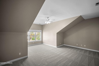 Spacious 5-bedroom, 3.5-bath home in the desirable gated Island on Island West Golf Club in South Carolina - for sale on GolfHomes.com, golf home, golf lot