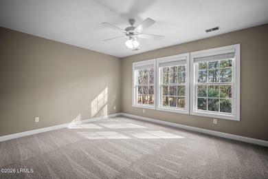 Spacious 5-bedroom, 3.5-bath home in the desirable gated Island on Island West Golf Club in South Carolina - for sale on GolfHomes.com, golf home, golf lot