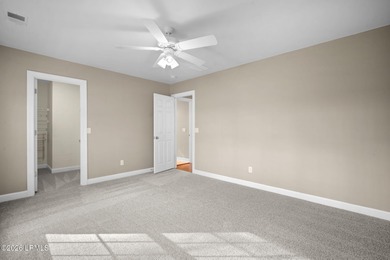 Spacious 5-bedroom, 3.5-bath home in the desirable gated Island on Island West Golf Club in South Carolina - for sale on GolfHomes.com, golf home, golf lot