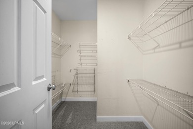 Spacious 5-bedroom, 3.5-bath home in the desirable gated Island on Island West Golf Club in South Carolina - for sale on GolfHomes.com, golf home, golf lot